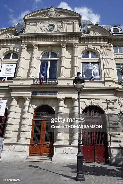 Picture of French philosopher Michel Foucault is seen on the city hall of the fourth Parisian district to mark the 30th anniversary of his death on...