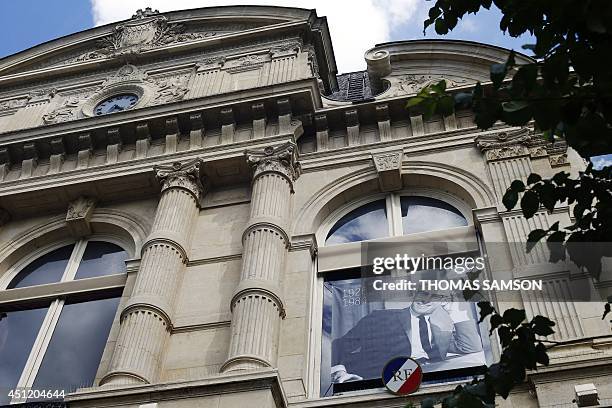 Picture of French philosopher Michel Foucault is seen on the city hall of the fourth Parisian district to mark the 30th anniversary of his death on...