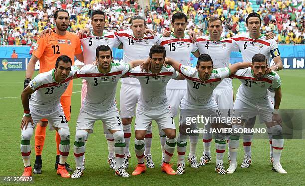 Iran's goalkeeper Alireza Haghighi, defender Amir Hossein Sadeghi, midfielder Andranik Teymourian, defender Pejman Montazeri, defender Jalal...