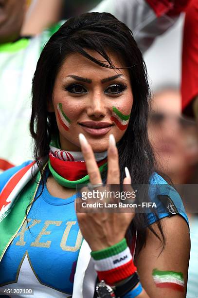 An Iran fan enjoys the atmosphere prior to the 2014 FIFA World Cup Brazil Group F match between Bosnia-Herzegovina and Iran at Arena Fonte Nova on...
