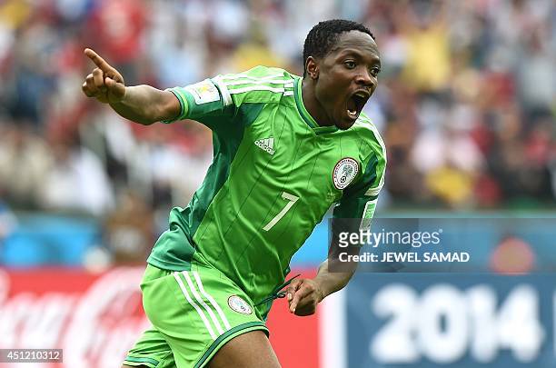 Nigeria's forward Ahmed Musa celebrates scoring his second goal during the Group F football match between Nigeria and Argentina at the Beira-Rio...