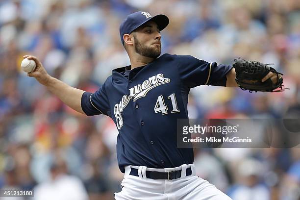 Marco Estrada of the Milwaukee Brewers pitches during the top of the first inning against the Washington Nationals at Miller Park on June 25, 2014 in...