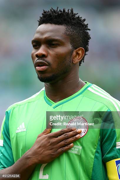Joseph Yobo of Nigeria looks on during the National Anthem prior to 2014 FIFA World Cup Brazil Group F match between Nigeria and Argentina at Estadio...