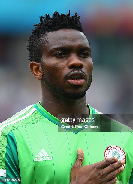 Joseph Yobo of Nigeria looks on during the National Anthem prior to the 2014 FIFA World Cup Brazil Group F match between Nigeria and Argentina at...