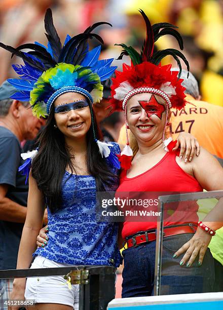 Fans pose prior to the 2014 FIFA World Cup Brazil Group E match between Honduras and Switzerland at Arena Amazonia on June 25, 2014 in Manaus, Brazil.