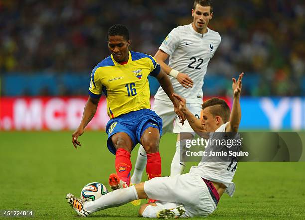 Antonio Valencia of Ecuador challenges Lucas Digne of France during the 2014 FIFA World Cup Brazil Group E match between Ecuador and France at...