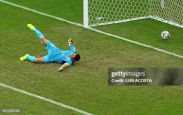 Honduras' goalkeeper Noel Valladares concedes a third goal to Switzerland during the Group E football match between Honduras and Switzerland at the...