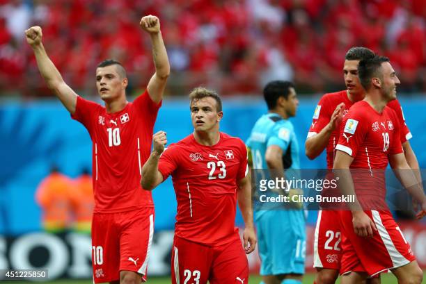 Xherdan Shaqiri of Switzerland celebrates scoring his team's third goal and completes his hat trick during the 2014 FIFA World Cup Brazil Group E...
