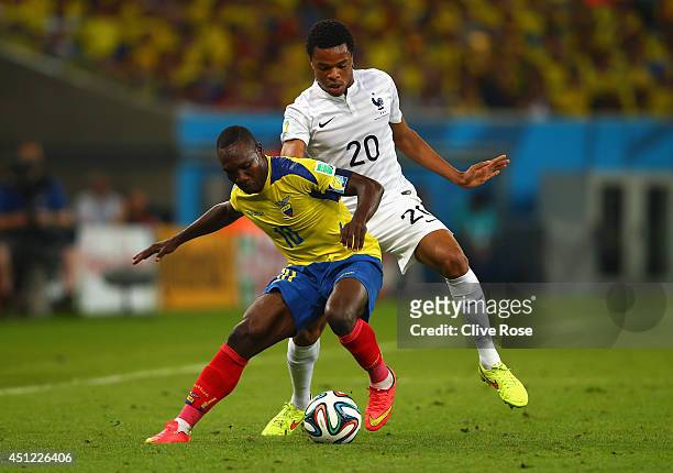 Oscar Bagui of Ecuador controls the ball against Loic Remy of France during the 2014 FIFA World Cup Brazil Group E match between Ecuador and France...