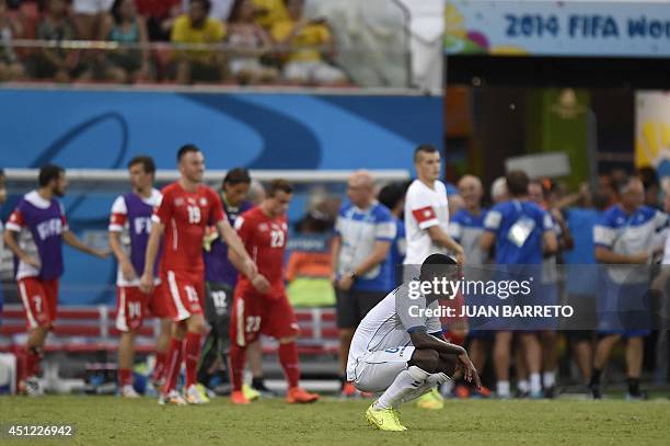 Honduras' defender Juan Carlos Garcia reacts at the end of the Group E football match between Honduras and Switzerland at the Amazonia Arena in...