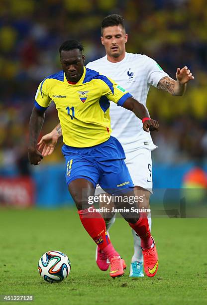 Felipe Caicedo of Ecuador controls the ball against Olivier Giroud of France during the 2014 FIFA World Cup Brazil Group E match between Ecuador and...