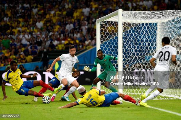 Olivier Giroud of France tries to shoot the ball from Loic Remy during the 2014 FIFA World Cup Brazil Group E match between Ecuador and France at...