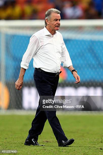 Head coach Ottmar Hitzfeld of Switzerland walks off the pitch after the 3-0 win in the 2014 FIFA World Cup Brazil Group E match between Honduras and...