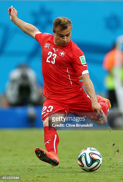 Xherdan Shaqiri of Switzerland kicks the ball during the 2014 FIFA World Cup Brazil Group E match between Honduras and Switzerland at Arena Amazonia...