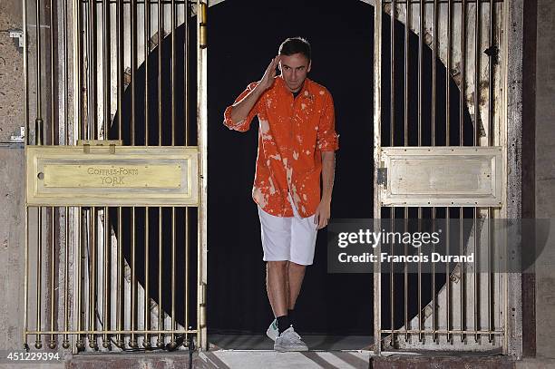 Fashion designer Raf Simons walks the runway during the Raf Simons show as part of the Paris Fashion Week Menswear Spring/Summer 2015 on June 25,...