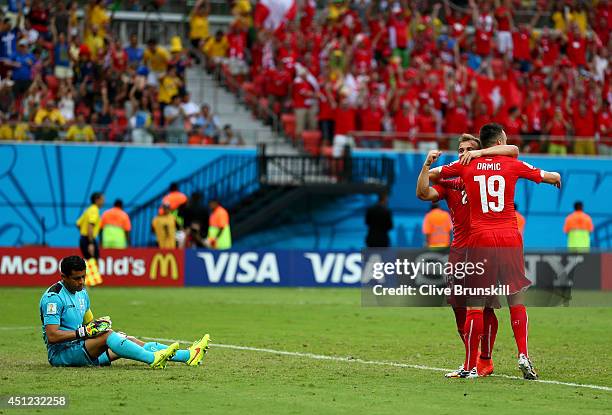 Xherdan Shaqiri of Switzerland celebrates scoring his team's third goal and complete his hat trick during the 2014 FIFA World Cup Brazil Group E...