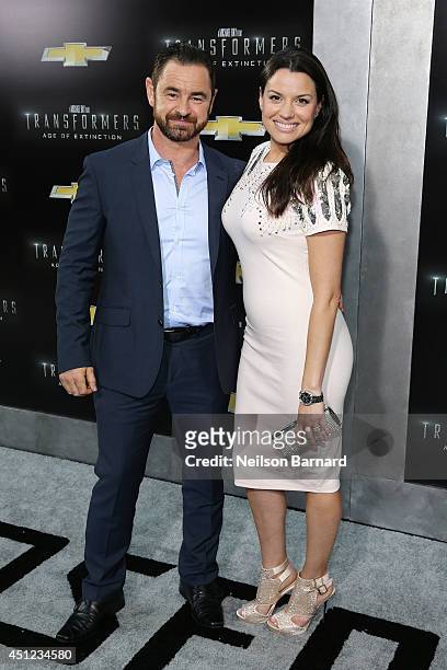 Actor Glenn Keogh and actress Caroline Morahan attend the New York Premiere of "Transformers: Age Of Extinction" at the Ziegfeld Theatre on June 25,...