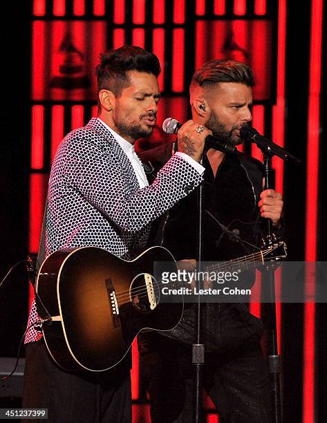 Recording artists Draco Rosa and Ricky Martin perform onstage during The 14th Annual Latin GRAMMY Awards at the Mandalay Bay Events Center on...