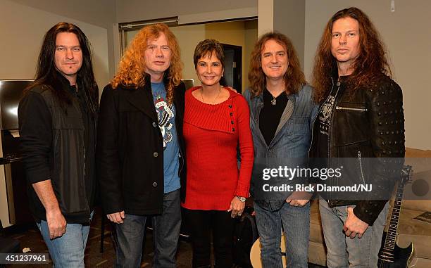 Nancy Jones pauses for a photo backstage with Megadeth's Shawn Drover, Dave Mustane, David Ellefson, and Chris Broderick during rehearsals of Playin'...