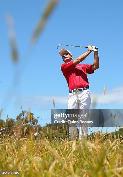 Kevin Streelman of the USA plays out of the rough during day two of the World Cup of Golf at Royal Melbourne Golf Course on November 22, 2013 in...