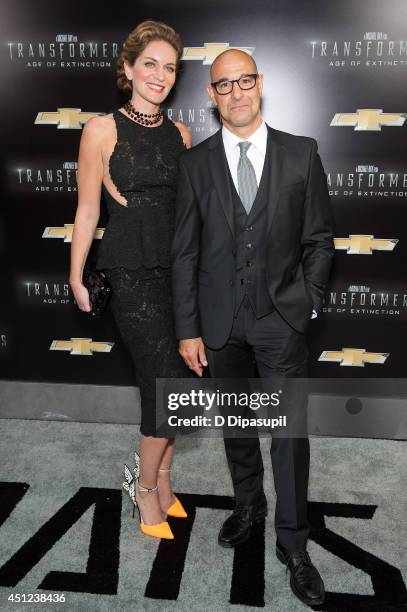 Stanley Tucci and wife Felicity Blunt attend the "Transformers: Age Of Extinction" premiere at Ziegfeld Theater on June 25, 2014 in New York City.