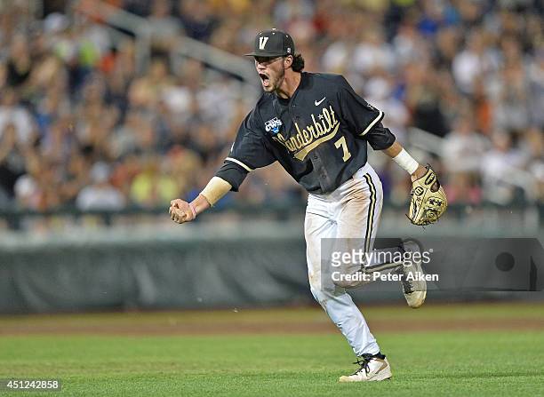 Second basemen Dansby Swanson of the Vanderbilt Commodores celebrates after recording the final out of the eighth inning against the Virginia...