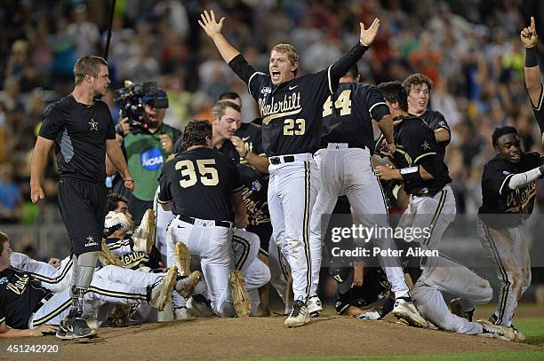 Vanderbilt Commodores player Will Cooper celebrates after beating the Virginia Cavaliers 3-2 to win the College World Series Championship Series on...