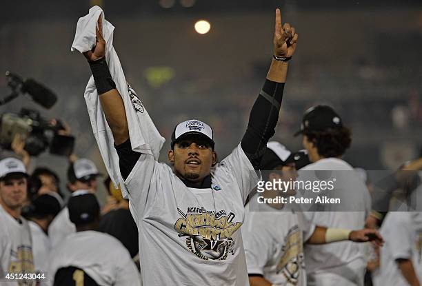 Vanderbilt Commodores player John Norwood celebrates after beating the Virginia Cavaliers 3-2 to win the College World Series Championship Series on...