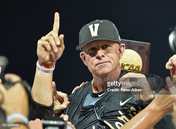 Head coach Tim Corbin of dthe Vanderbilt Commodores celebrates after beating the Virginia Cavaliers 3-2 to win the College World Series Championship...