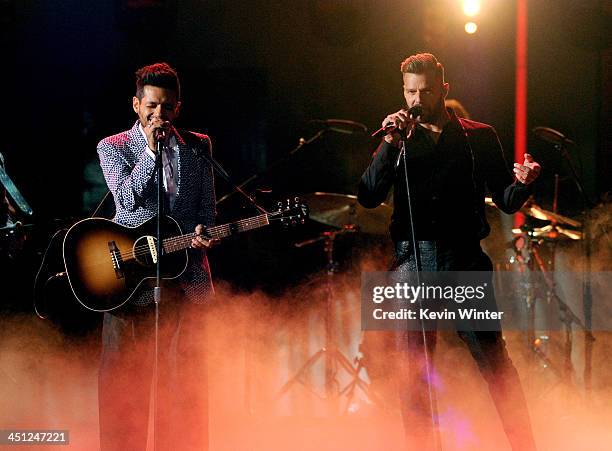 Recording artists Draco Rosa and Ricky Martin perform onstage during The 14th Annual Latin GRAMMY Awards at the Mandalay Bay Events Center on...