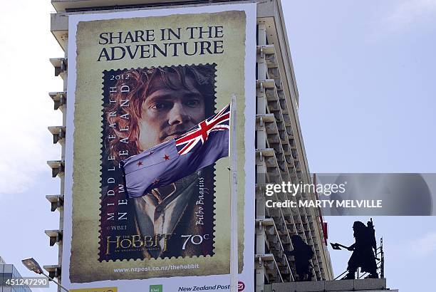 Giant poster of a New Zealand stamp featuring the character Bilbo Baggins is pictured on the side of the New Zealand Post building ahead of the...