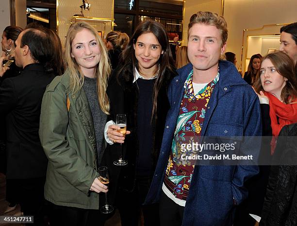 Allegra Faggionato, Viola Arrivabene and Felix Cooper attend the Furla flagship store re-opening on November 21, 2013 in London, England.
