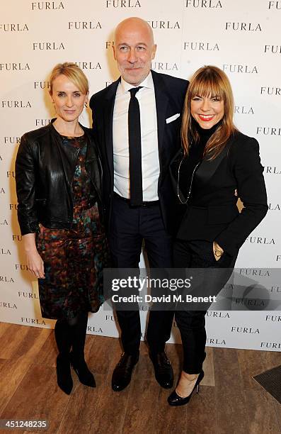 Trish Halpin, Furla CEO Eraldo Poletto and Justine Southall attend the Furla flagship store re-opening on November 21, 2013 in London, England.