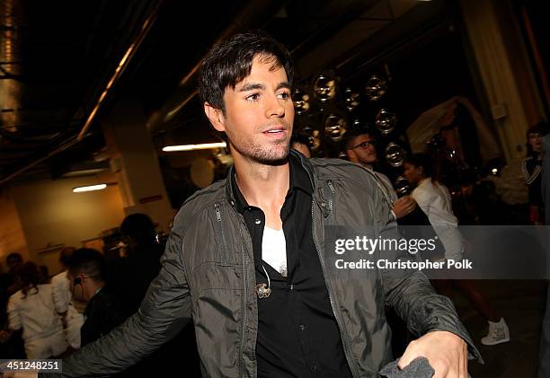 Singer Enrique Iglesias poses backstage during the 14th Annual Latin GRAMMY Awards held at the Mandalay Bay Events Center on November 21, 2013 in Las...