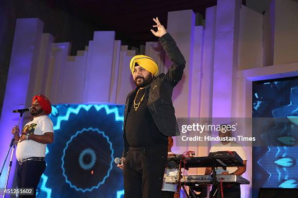 Punjabi pop singer Daler Mehandi performs at the wedding ceremony of Mayank Bajaj and Isha Kapoor on June 21, 2014 in New Delhi, India. Mayank Bajaj...