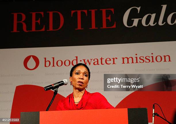 President and CEO of CARE USA Dr. Helene Gayle accepts award at the Red Tie Gala Hosted by Blood:Water Mission and sponsored by Noodle & Boo at...