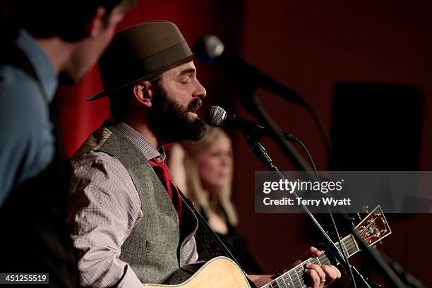 Drew Holcomb of Drew Holcomb and the Neighbors performs during the Red Tie Gala Hosted by Blood:Water Mission and sponsored by Noodle & Boo at Hutton...