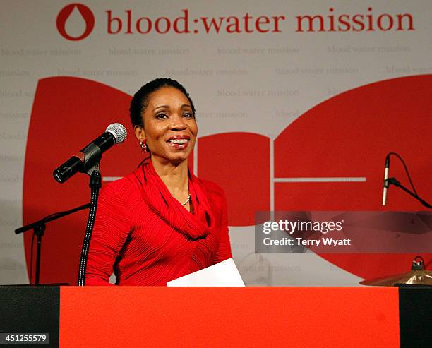 President and CEO of CARE USA Dr. Helene Gayle accepts award at the Red Tie Gala Hosted by Blood:Water Mission and sponsored by Noodle & Boo at...