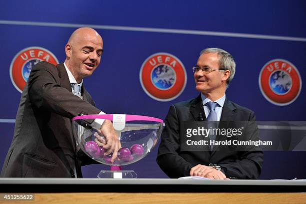 General Secretary Gianni Infantino and UEFA Competition Director Giorgio Marchetti proceed to the UEFA 2014/15 Women's Champions League Qualifying...