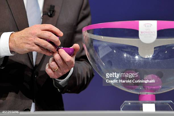 Draw ball is opened during the UEFA 2014/15 Women's Champions League Qualifying Round draw at the UEFA headquarters, The House of European Football,...
