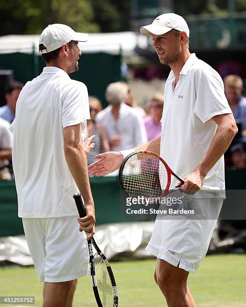 L-r Igor Zelenay of Slovakia and Andreas Siljestrom of Sweden during their Gentlemen's Doubles first round match against John-Patrick Smith of...