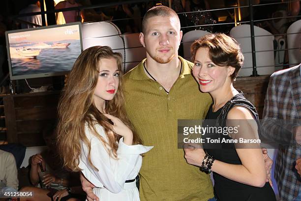 Russian Actress & Producer Agata Gotova poses with actress Anna Klimkina and kickboxing world champion Vladimir Mineev during the Chik Radio Party at...