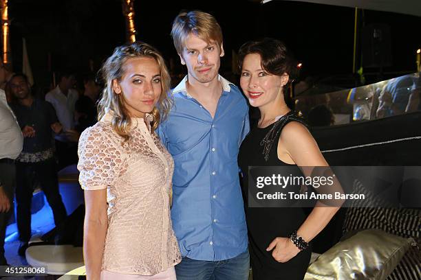 Russian Actress & Producer Agata Gotova poses with Anastasia Graff and Christopher Smurfit during the Chik Russian Party at the Sea Lounge Beach Club...