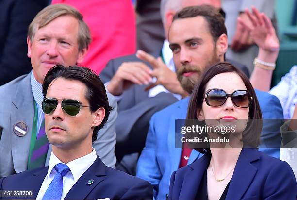 James Middleton , brother of the Duchess of Cambridge, and British actress Michelle Dockery watch the men's singles second round match between Rafael...