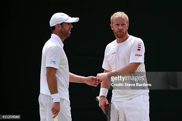 Paul Hanley of Australia and Lukas Dlouhy of Czech Republic during their Gentlemen's Doubles first round match against Santiago Gonzalez of Mexico...