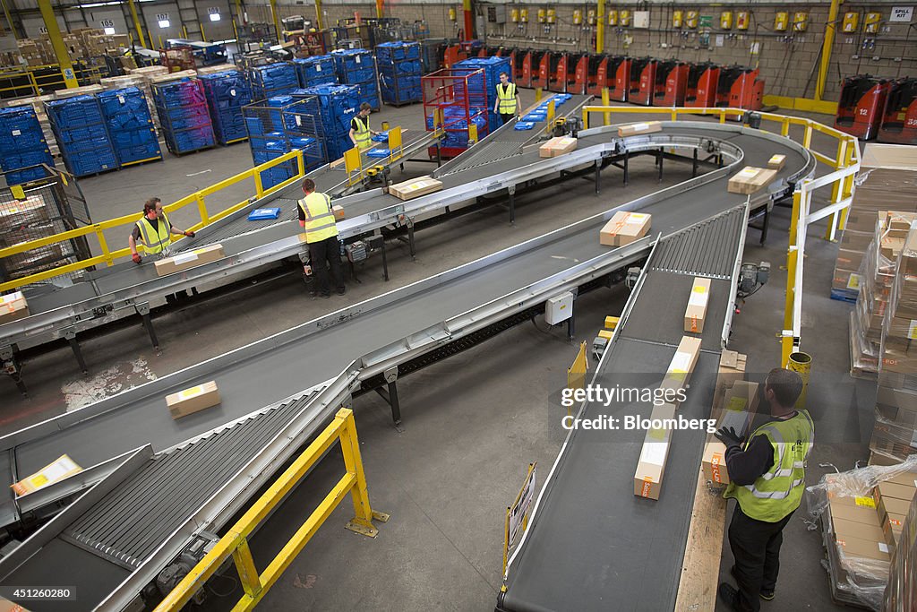 Packages travel along a conveyor belt before being prepared for... News ...