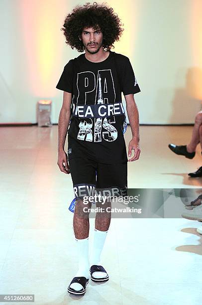 Model walks the runway at the Andrea Crews Spring Summer 2015 fashion show during Paris Menswear Fashion Week on June 26, 2014 in Paris, France.