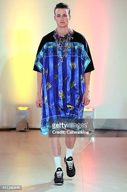 Model walks the runway at the Andrea Crews Spring Summer 2015 fashion show during Paris Menswear Fashion Week on June 26, 2014 in Paris, France.