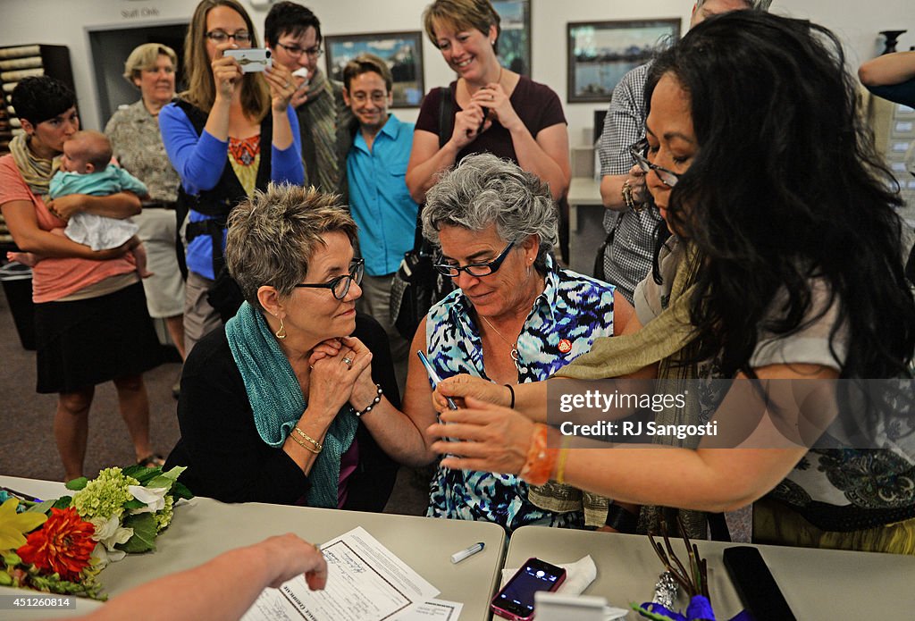 Same-sex couples l line up at Boulder County Clerk's office to apply for marriage licenses