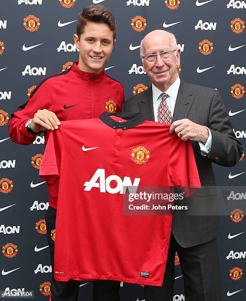 Manchester United's Sir Bobby Charlton unveils new signing Ander Herrera at the AON Training Complex on June 25, 2014 in Manchester, England.